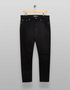 Topman - Sorte skinny-jeans med stretch og huller på knæet i økologisk bomuldsblanding
