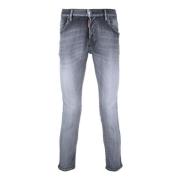 Sorte jeans med lav talje og falmet effekt